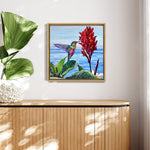 Charger l'image dans la galerie, Tableau exotique, un colibri aux reflets verts et bleus butinant parmi les fleurs tropicales, pour une décoration murale lumineuse et raffinée.