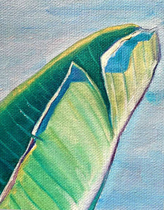 Tableau tropical feuilles de bananier et peinture d’un paysage d’océan turquoise pour déco murale nature exotique et bohème